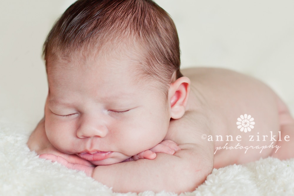 newborn sleeping with head on arms Mooresville and Lake Norman newborn baby photographer